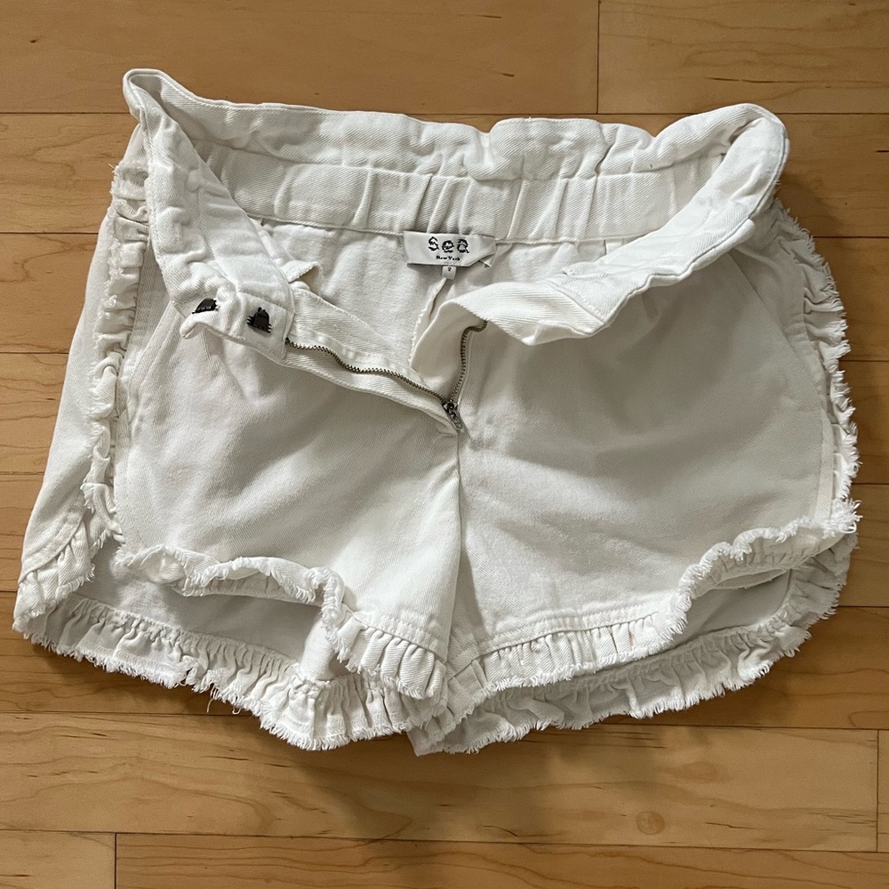 SEA New York 🤍 👖 🩳 size: 2. Neon acid raw-edge ruffled denim shorts.